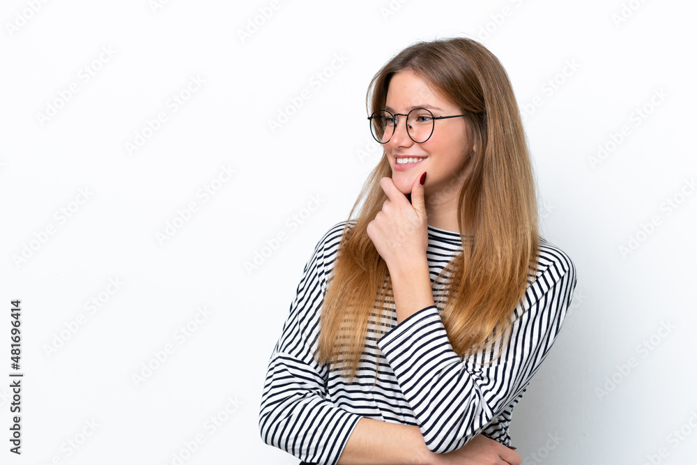 Young caucasian woman isolated on white background looking to the side and smiling Young caucasian woman isolated on white background looking to the side and smiling