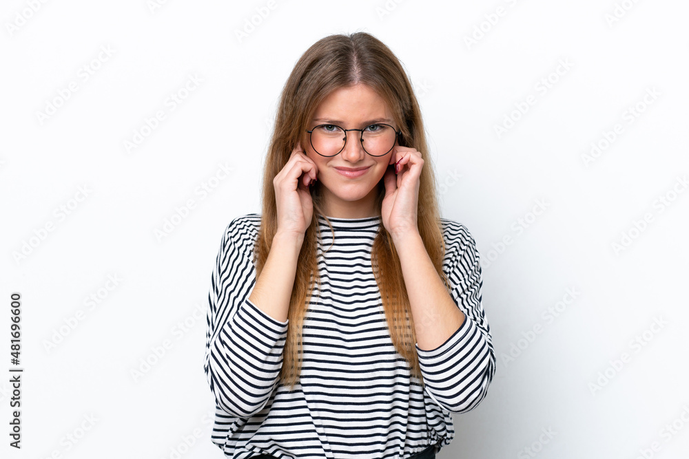 Young caucasian woman isolated on white background frustrated and covering ears Young caucasian woman isolated on white background frustrated and covering ears