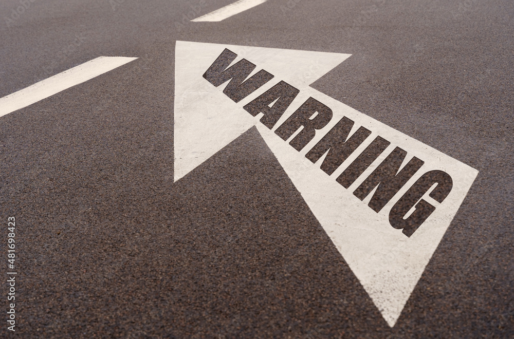 Markings and an arrow with the inscription - WARNING Markings and an arrow with the inscription - WARNING