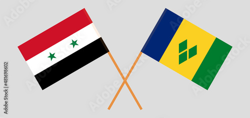 Crossed flags of Syria and Saint Vincent and the Grenadines. Official colors. Correct proportion