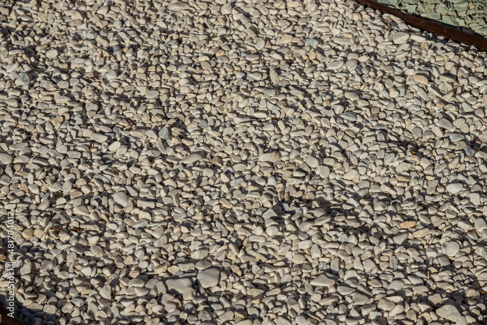 small bright pebbles and gravel as background or texture small bright pebbles and gravel as background or texture