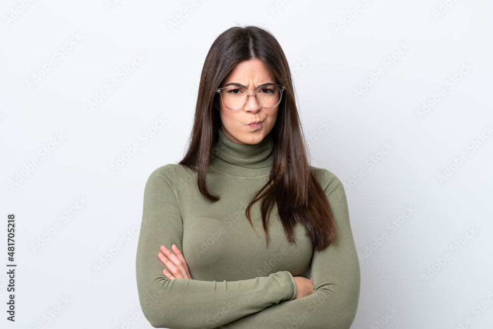 Young Brazilian woman isolated on white background feeling upset Young Brazilian woman isolated on white background feeling upset