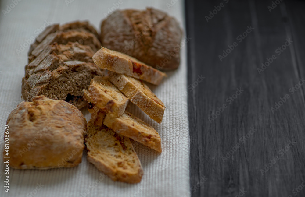 Fototapeta premium Baked bread on a sunlight with shadows