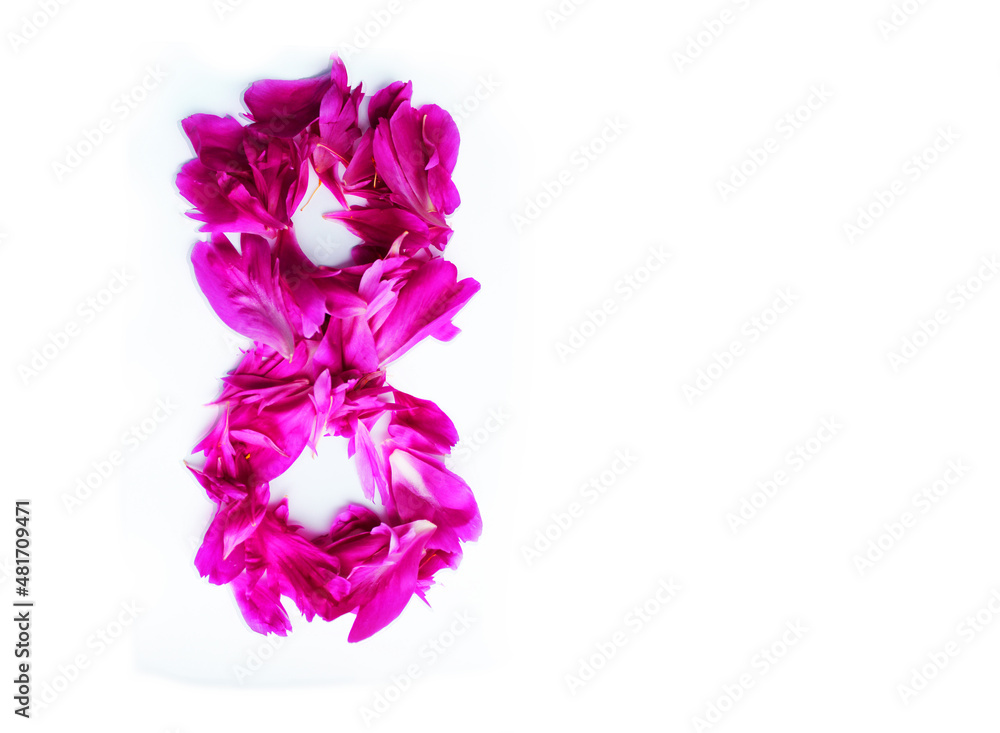 March 8 from flower petals on a white background. congratulations postcard holiday. floral leaves on the table for the holiday .. postcard, congratulations to March 8. women's Day. valentine's day March 8 from flower petals on a white background. congratulations postcard holiday. floral leaves on the table for the holiday .. postcard, congratulations to March 8. women's Day. valentine's day