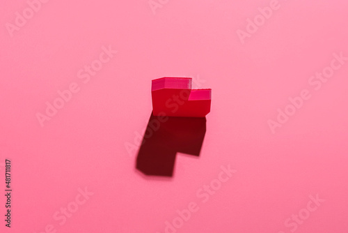 Red file folder with stacke...