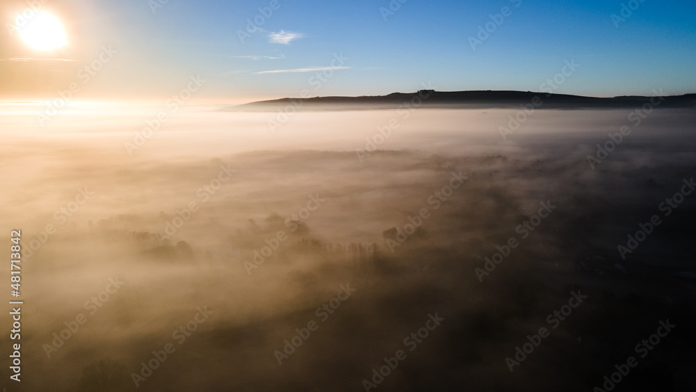 Aerial picture of foggy morning over the park, forest, West Sussex, UK Aerial picture of foggy morning over the park, forest, West Sussex, UK