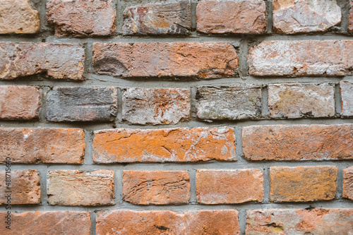 Closeup texture of a red brick wall.