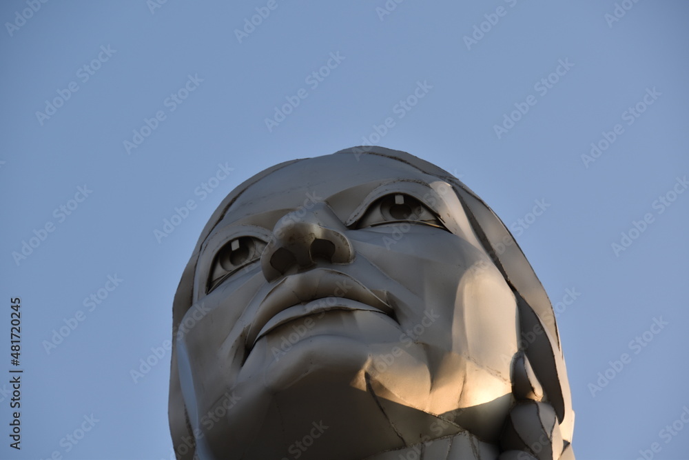 Foto de Dignity" statue depicting a Native American woman holding a