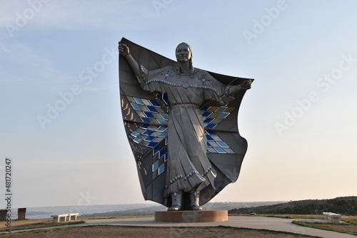 Dignity" statue depicting a Native American woman holding a star quilt, located near Chamberlain, SD