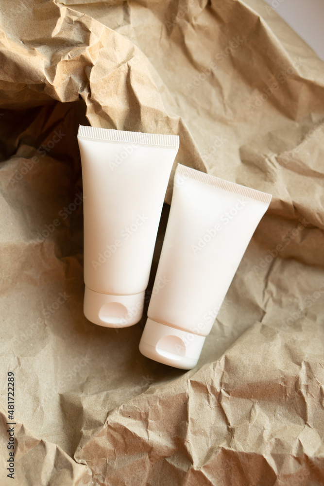 White tube of cream mock-up, design ready cosmetic and care product packaging White tube of cream mock-up, design ready cosmetic and care product packaging