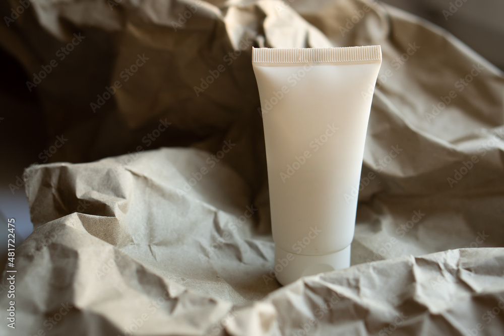 White tube of cream mock-up, design ready cosmetic and care product packaging White tube of cream mock-up, design ready cosmetic and care product packaging