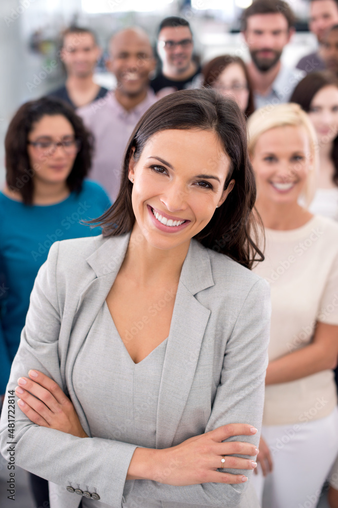 She inspires confidence amongst her employees. Cropped shot of a group of positive businesspeople.