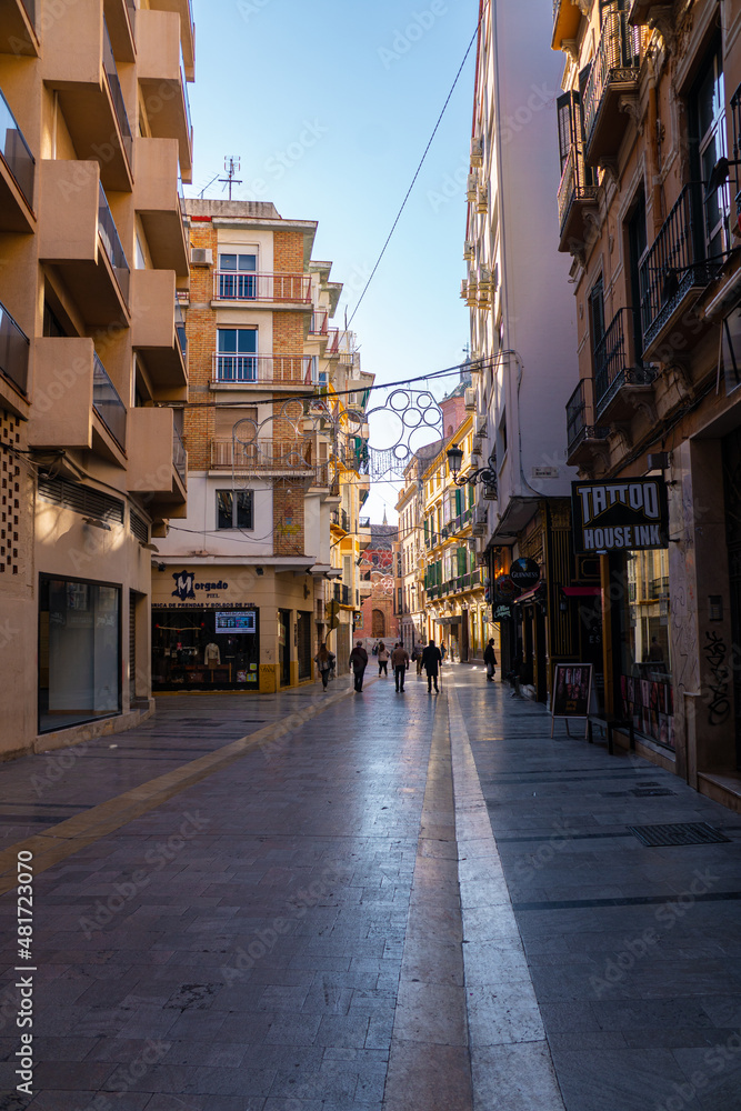 Malaga's old town on a beautiful sunny day at Christmas. Most of the city's streets are adorned with Christmas decorations.Malaga.Spain,Costa del sol, Andalusia (Series)