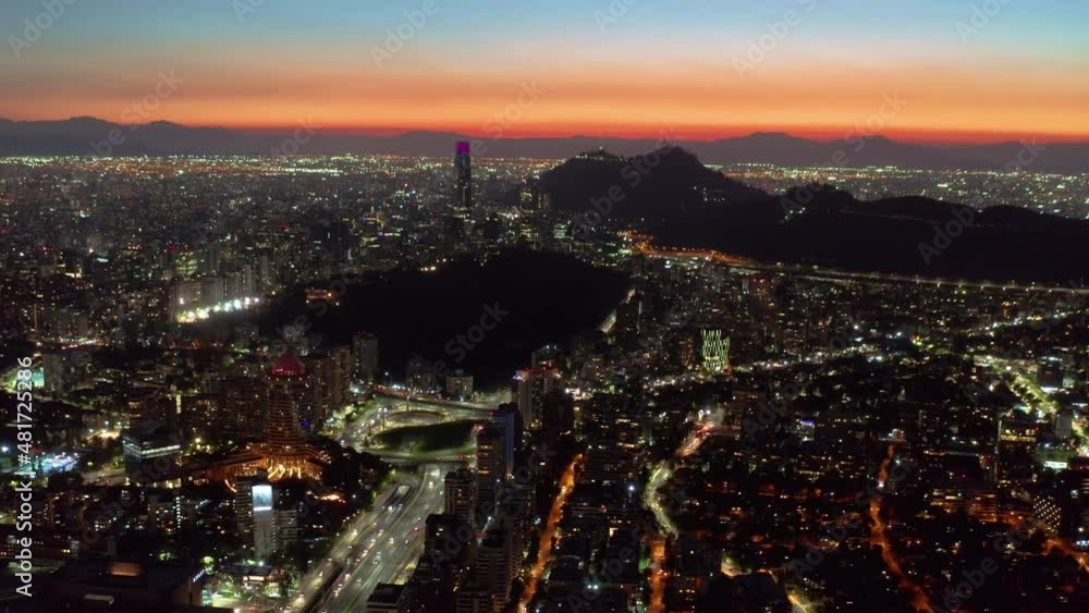 Aerial View Of Golden Yellow Sunset Over Santiago City In Chile. city Lights. dolly back Aerial View Of Golden Yellow Sunset Over Santiago City In Chile. city Lights. dolly back