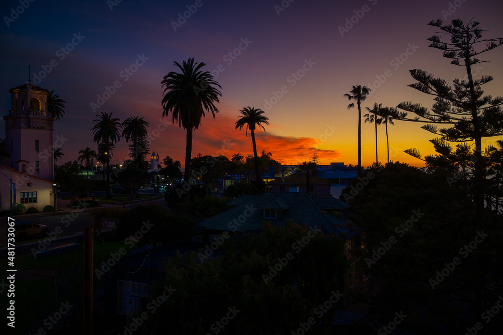 2022-01-19 BRIGHT ORANGE SUNSET IN LA JOLLA CALIFORNIA FROM PROSPECT STREET WITH CHRUCH, BISHOP SCHOOL AND NEW ART MUSEUM IN THE BACKGROUND 2022-01-19 BRIGHT ORANGE SUNSET IN LA JOLLA CALIFORNIA FROM PROSPECT STREET WITH CHRUCH, BISHOP SCHOOL AND NEW ART MUSEUM IN THE BACKGROUND