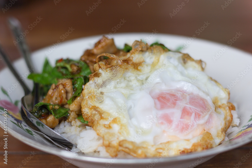 Rice topped with stir-fried pork and basil Rice topped with stir-fried pork and basil