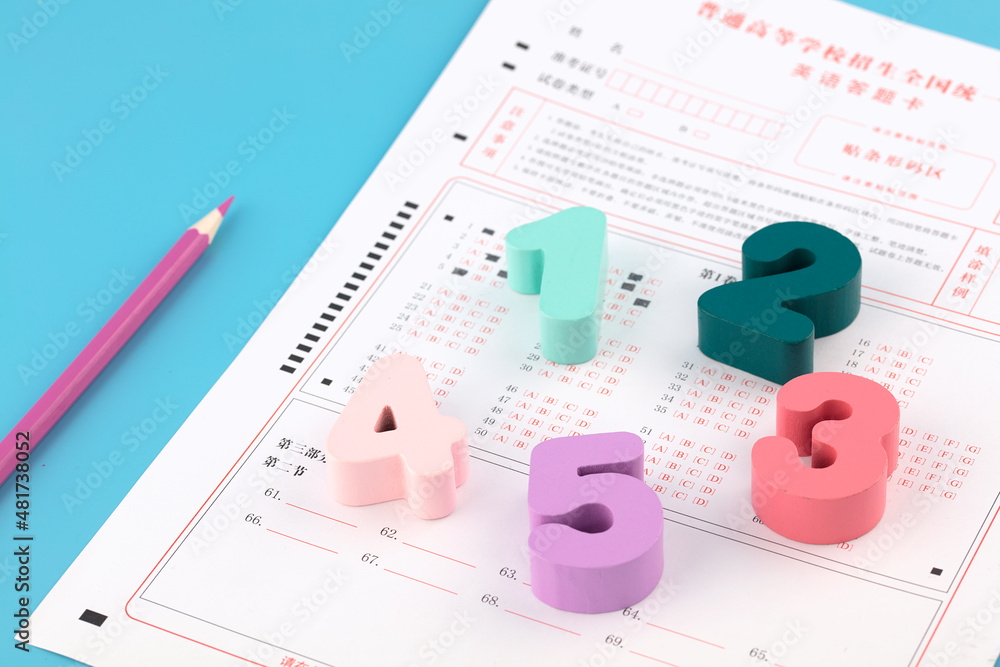 Numbers and colored pencils on the answer sheet Numbers and colored pencils on the answer sheet