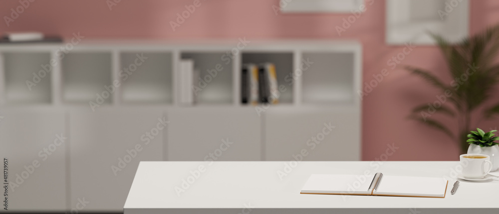 Modern stylish pink office workspace interior with copy space on white worktable Modern stylish pink office workspace interior with copy space on white worktable