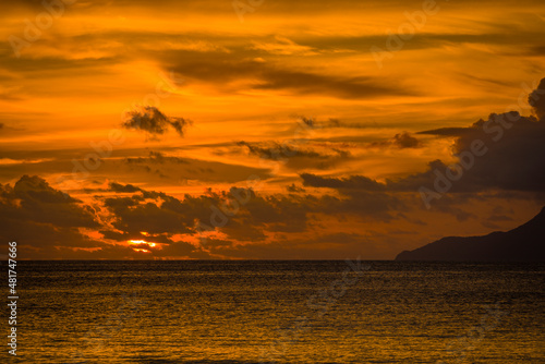 Beautiful sunset on the famous Beau Vallon beach on Mahe island, Seychelles