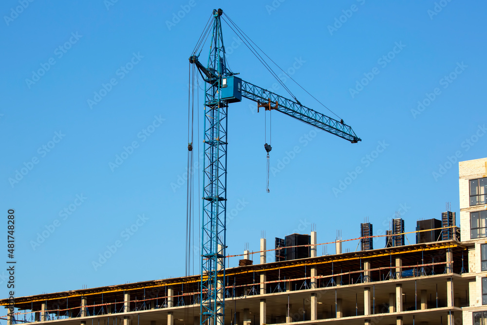 construction of a multistory building with construction crane