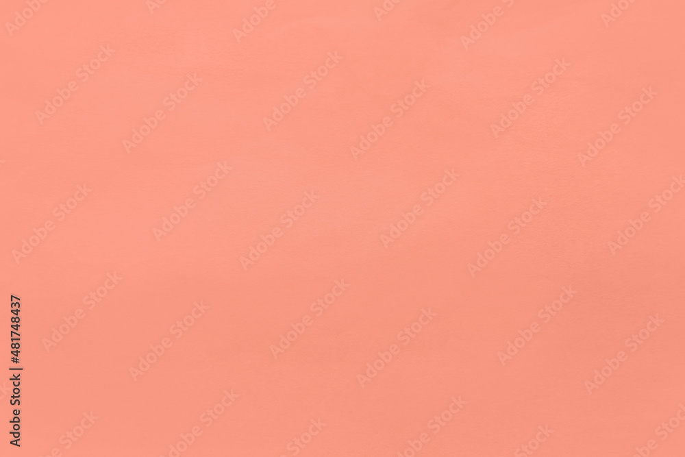 Fototapeta premium Very soft red or pale red color plain solid coral tone on organic recycled paper minimal texture background