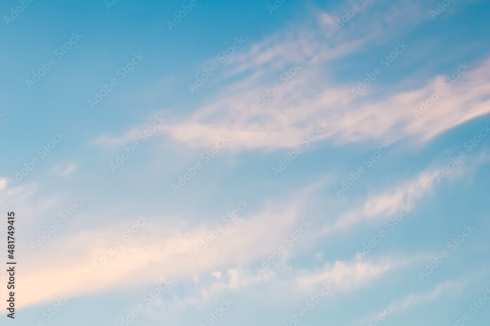 Background of blue sky with white pink clouds in sunset Background of blue sky with white pink clouds in sunset
