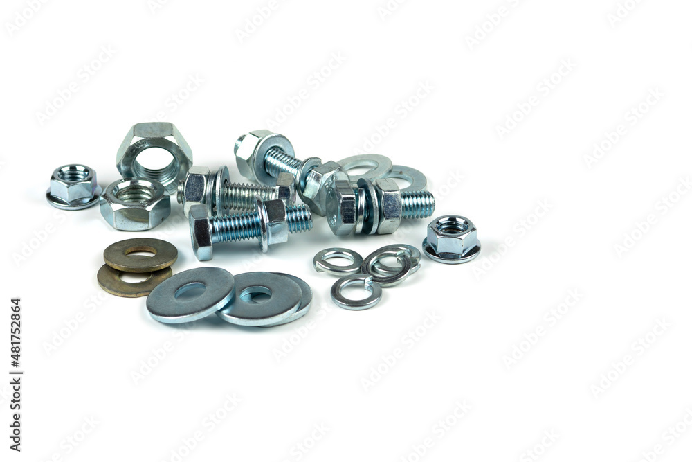 metal bolts and nuts with round washers close-up on a white background. copy space metal bolts and nuts with round washers close-up on a white background. copy space