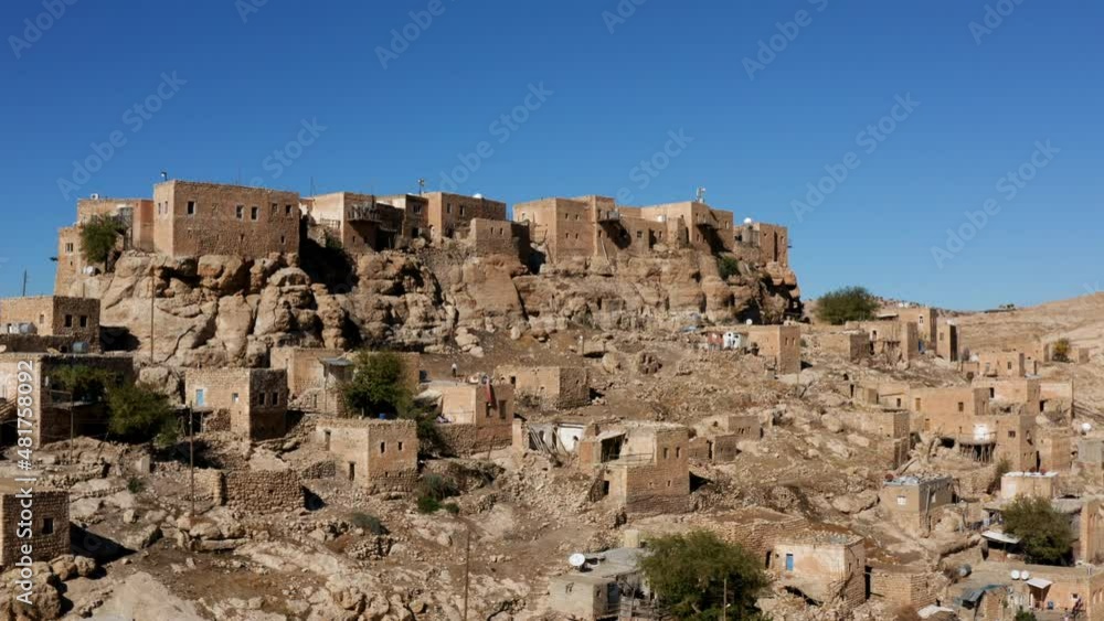 Artuqid Architecture Landscape Of Mardin City On A Rocky Hill In Anatolia, Turkey. - aerial Artuqid Architecture Landscape Of Mardin City On A Rocky Hill In Anatolia, Turkey. - aerial