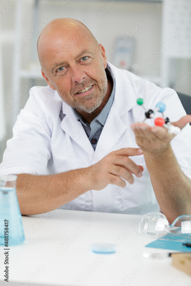 male scientist experimenting molecule structure male scientist experimenting molecule structure