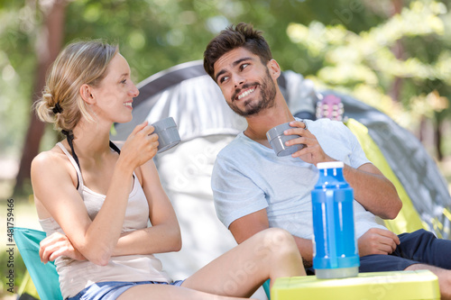 young couple at a campsite