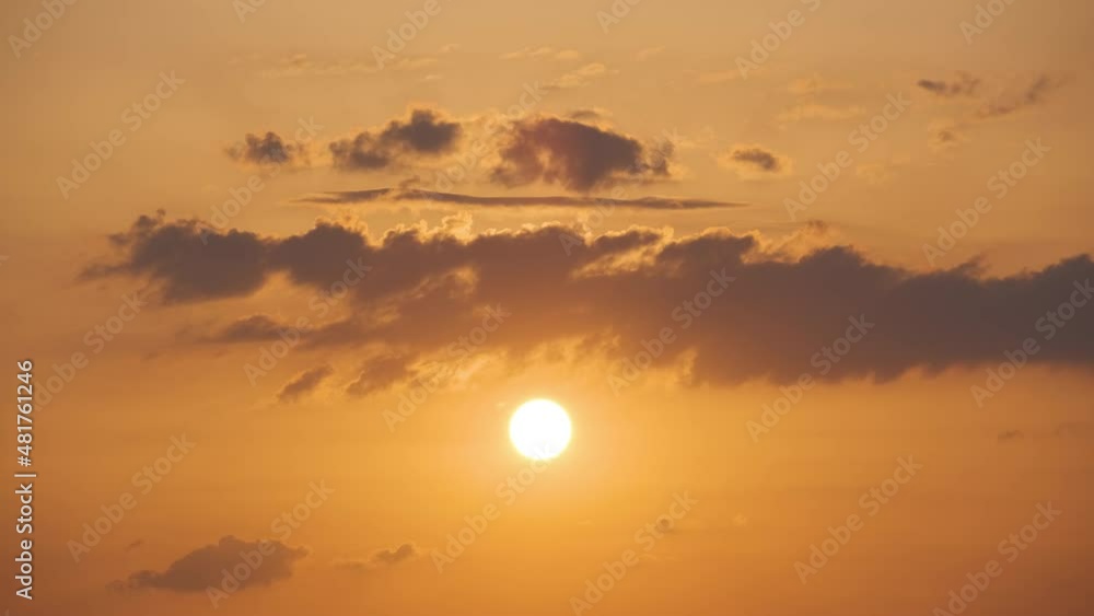 Bright colorful sunset sky with rays of setting sun and vivid dark clouds Bright colorful sunset sky with rays of setting sun and vivid dark clouds