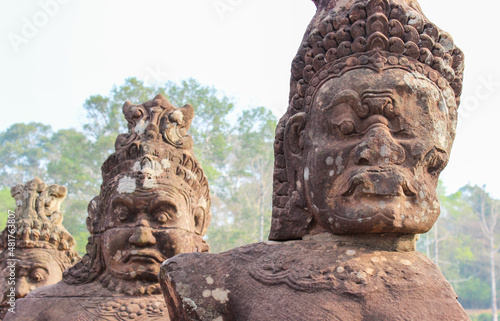 Gatekeeper stone statue in  Angkor Wat   