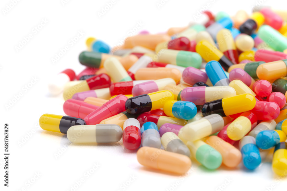 colorful pills isolated on white