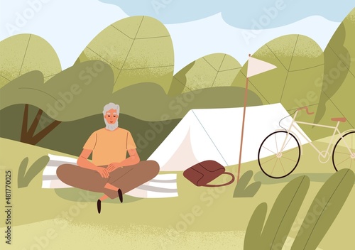 Man alone in nature on summer holidays. Tourist relaxing in camping, resting ...