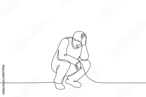 man squatting clutching head - one line drawing vector. concept of despair, suffering, unhappiness, depression