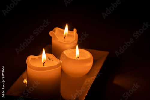 three burning candles, Mallorca, Balearic Islands, Spain