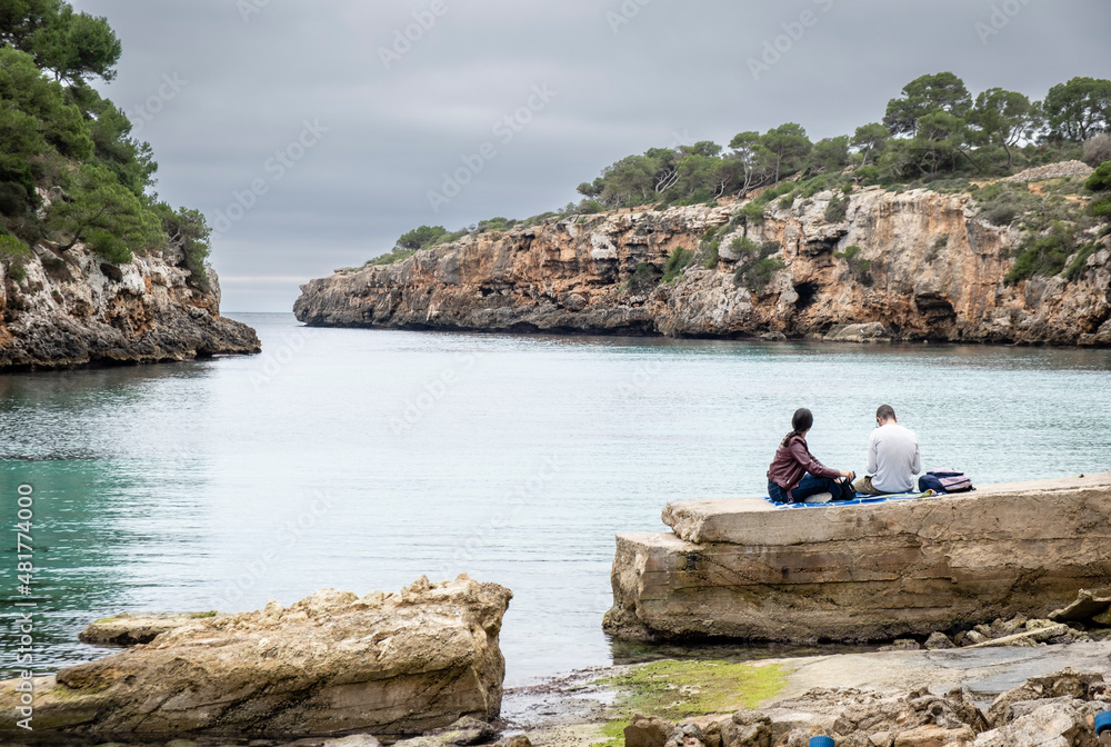 couple enjoying the seascape, Cala Pi, Llucmajor, Mallorca, Balearic Islands, Spain