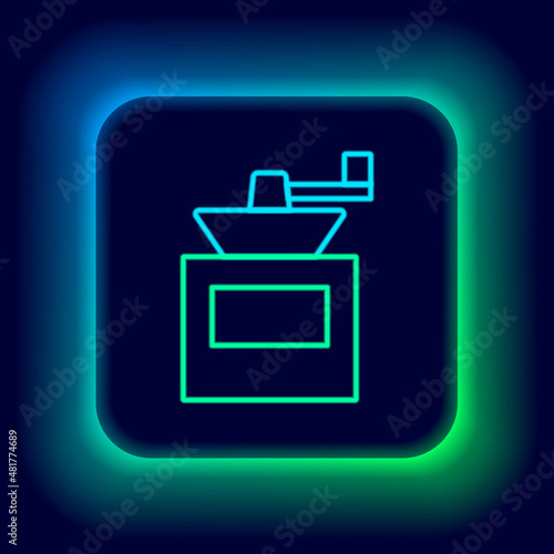 Glowing neon line Manual coffee grinder icon isolated on black background. Colorful outline concept. Vector