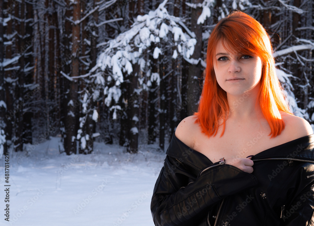 beautiful girl with red hair on the background of nature beautiful girl with red hair on the background of nature