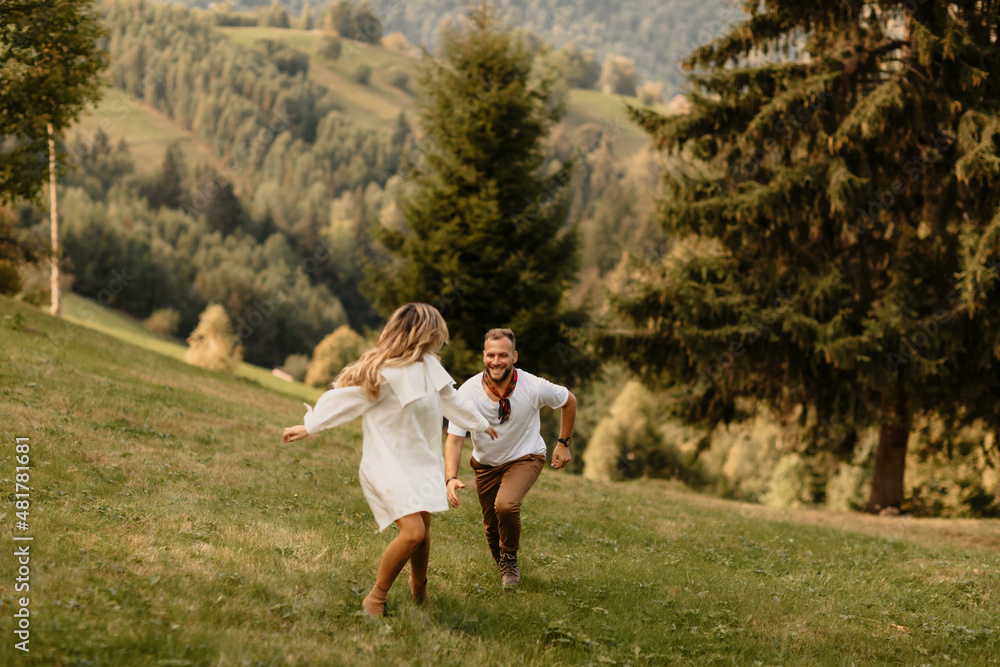 Millennial couple of lovers enjoying non-traditional Valentine’s Day time outdoor. Handsome guy with nice girl on deep intimate moment Millennial couple of lovers enjoying non-traditional Valentine’s Day time outdoor. Handsome guy with nice girl on deep intimate moment
