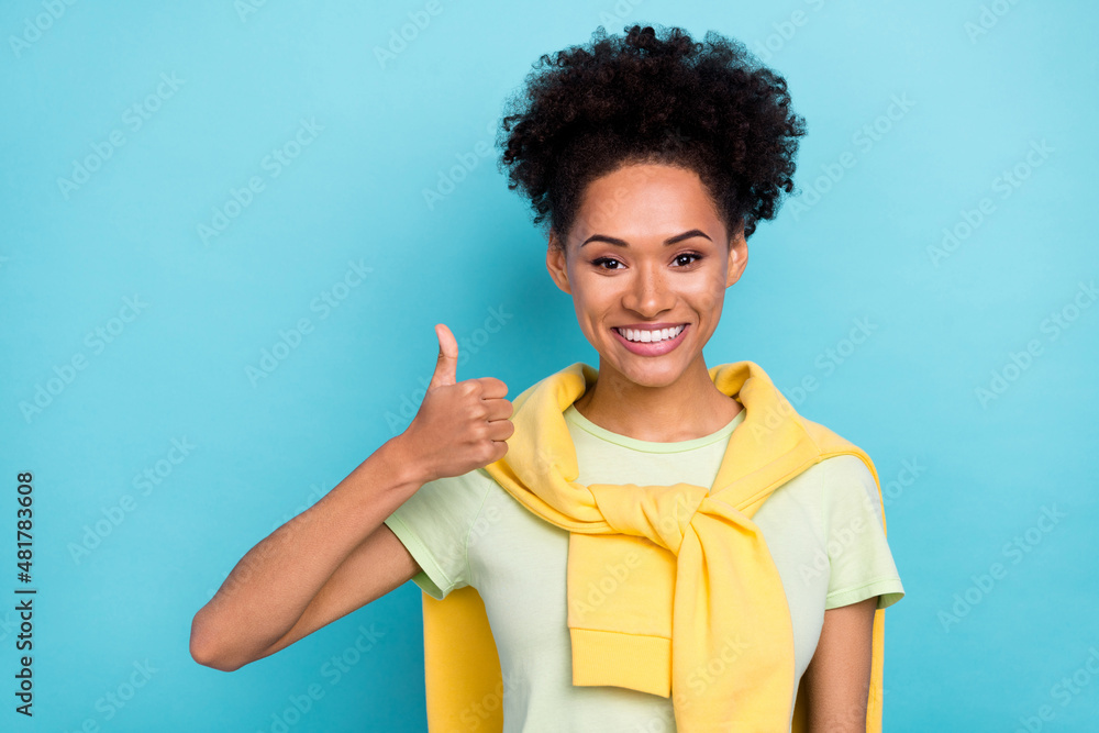 Photo of youth african girl promoter show thumb-up ad approve good select isolated over blue color background