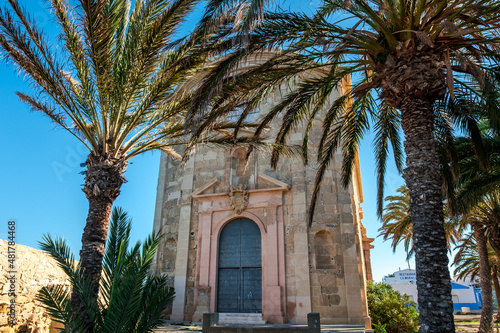 The old church surrounded by palm trees on the island of Tabarca  in the Spanish Mediterranean  in front of Santa Pola  Alicante