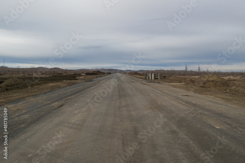 Newly built road. Road under construction. New area in the city. Big avenue. Cloudy. Ust-Kamenogorsk (kazakhstan)