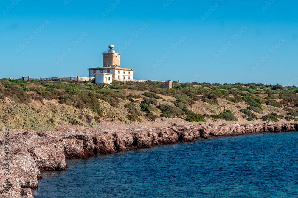 The lighthouse of the old island of Tabarca, in the Spanish Mediterranean, in front of Santa Pola, Alicante