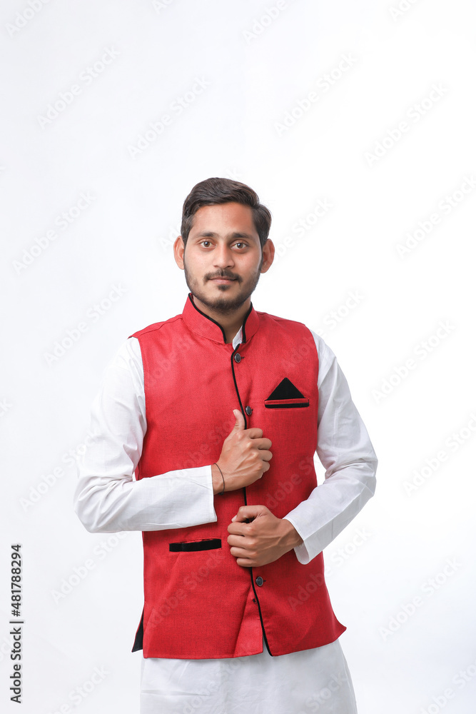 Young indian farmer in traditional wear and giving expression on white background. Young indian farmer in traditional wear and giving expression on white background.