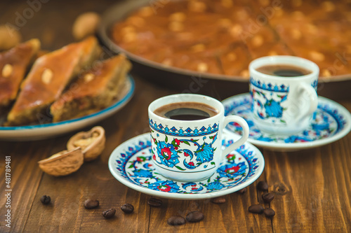 Baklava on the table and Turkish coffee. Selective focus.