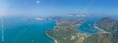 Amazing aerial view of the Lamma Power Station, Hong Kong and the mountain landscape nearby photo
