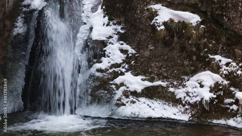 Snowy winter landscape with waterfall on a wild stream. The Mala Fatra national park in Slovakia, Europe. Snowy winter landscape with waterfall on a wild stream. The Mala Fatra national park in Slovakia, Europe.