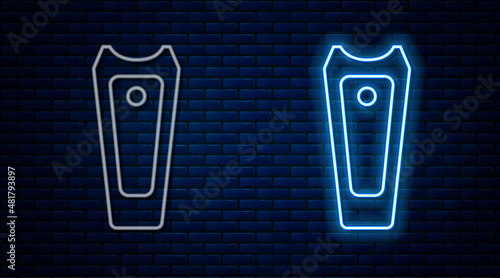 Glowing neon line Nail cutter icon isolated on brick wall background. Nail clipper. Vector
