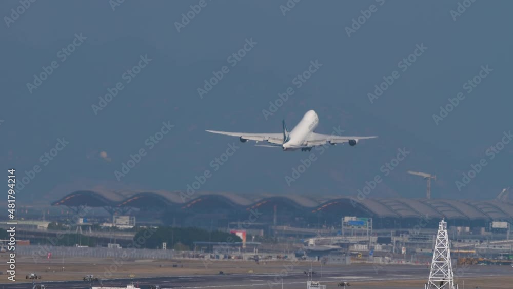 Airfreighter departure and climb. Civil jet airplane takeoff, long shot rear view. Commercial aircraft flying away. Tourism and travel concept Airfreighter departure and climb. Civil jet airplane takeoff, long shot rear view. Commercial aircraft flying away. Tourism and travel concept